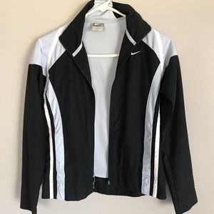 Nike black jacket with light blue and white on sides.